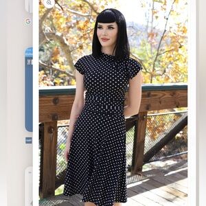 Retro-Licious 50’s rockabilly vibe polka dot black dress sz m with front tie